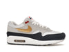Nike Air Max 1 Olympic - Obsidian/White/Light Smoke Grey/Metallic Gold - HM9604-400 - 01